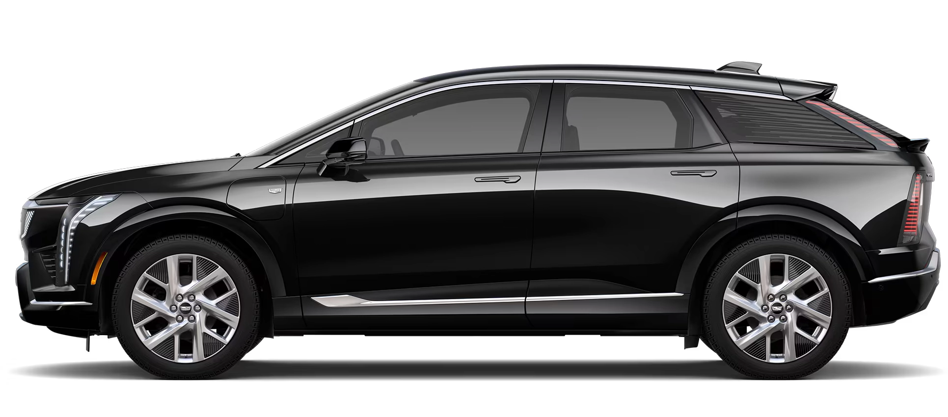 Cadillac OPTIQ 500 E4 AWD z profilu - elektryczny SUV z baterią 75 kWh, ładowaniem AC 22 kW przez Type 2 i DC 110 kW przez CCS2