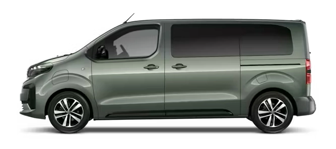 Peugeot e-Traveller z profilu - elektryczny van osobowy z baterią 75 kWh, ładowarką pokładową 7,4 kW lub 11 kW przez Type 2 i DC do 100 kW